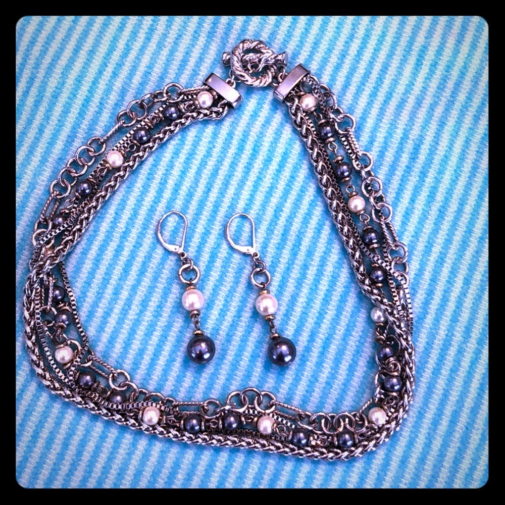 Matching silver necklace and earrings